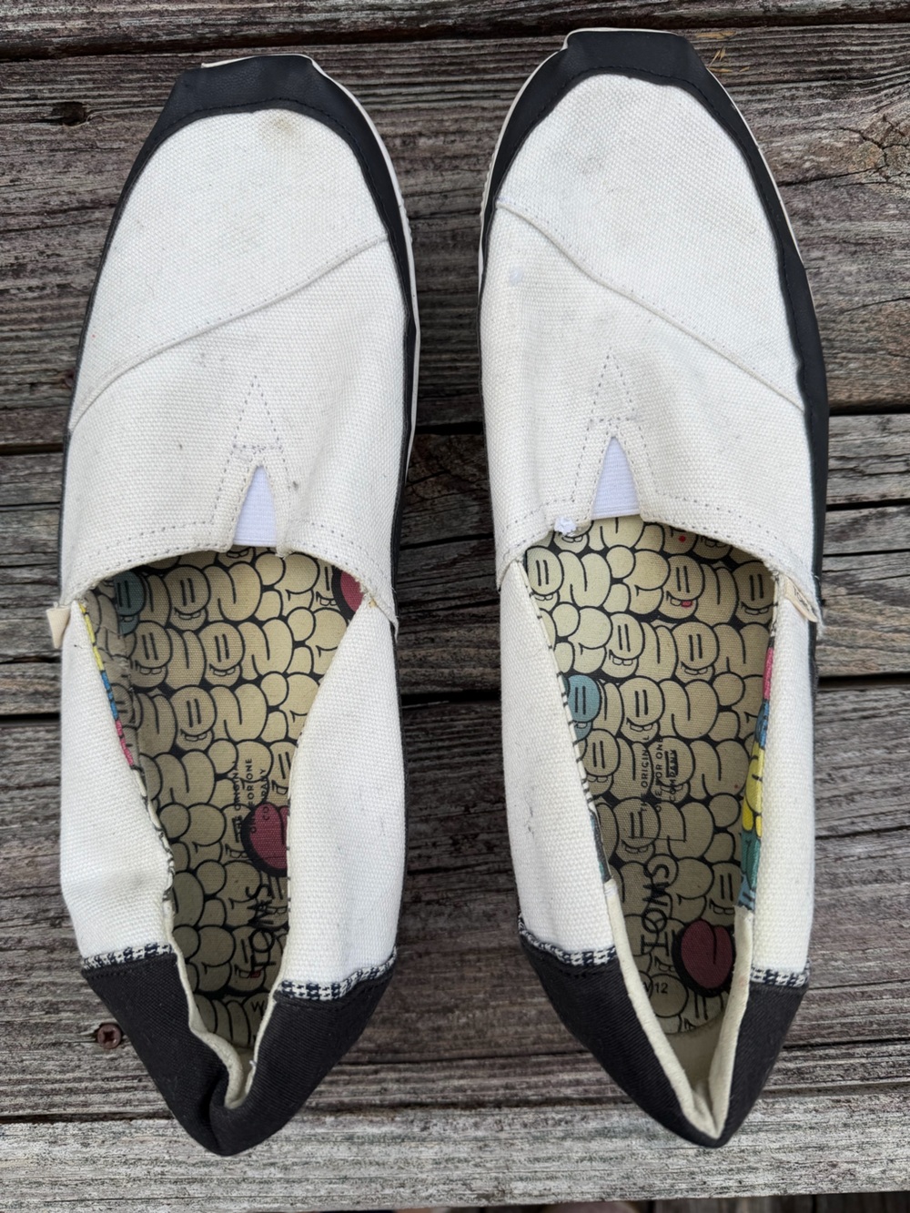 Tom’s White Slip-On Canvas Shoes with Black Trim - Women’s 12 / Men’s 10